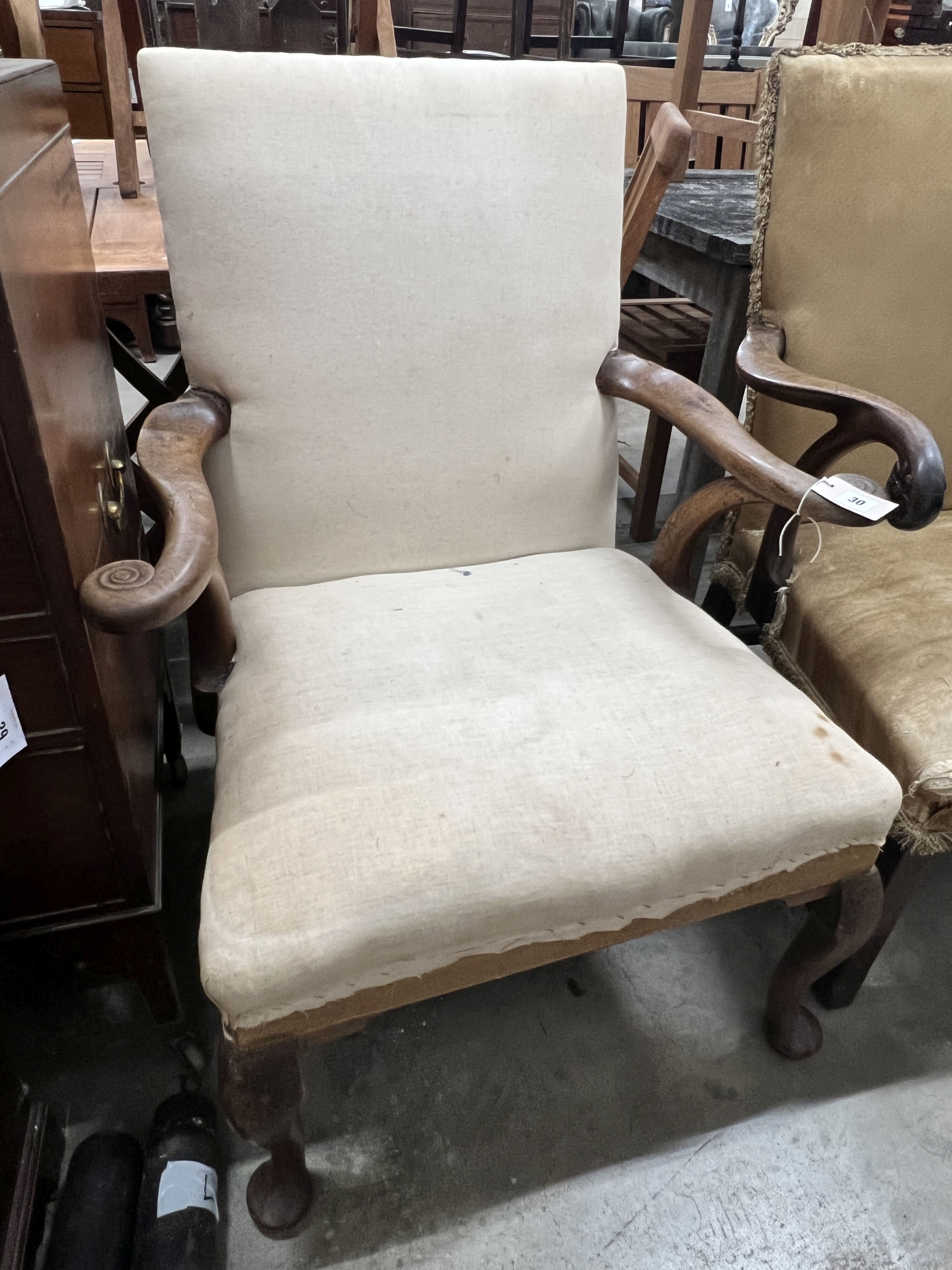 A Georgian mahogany scroll arm elbow chair on cabriole legs and pad feet, width 72cm, depth 60cm, height 98cm